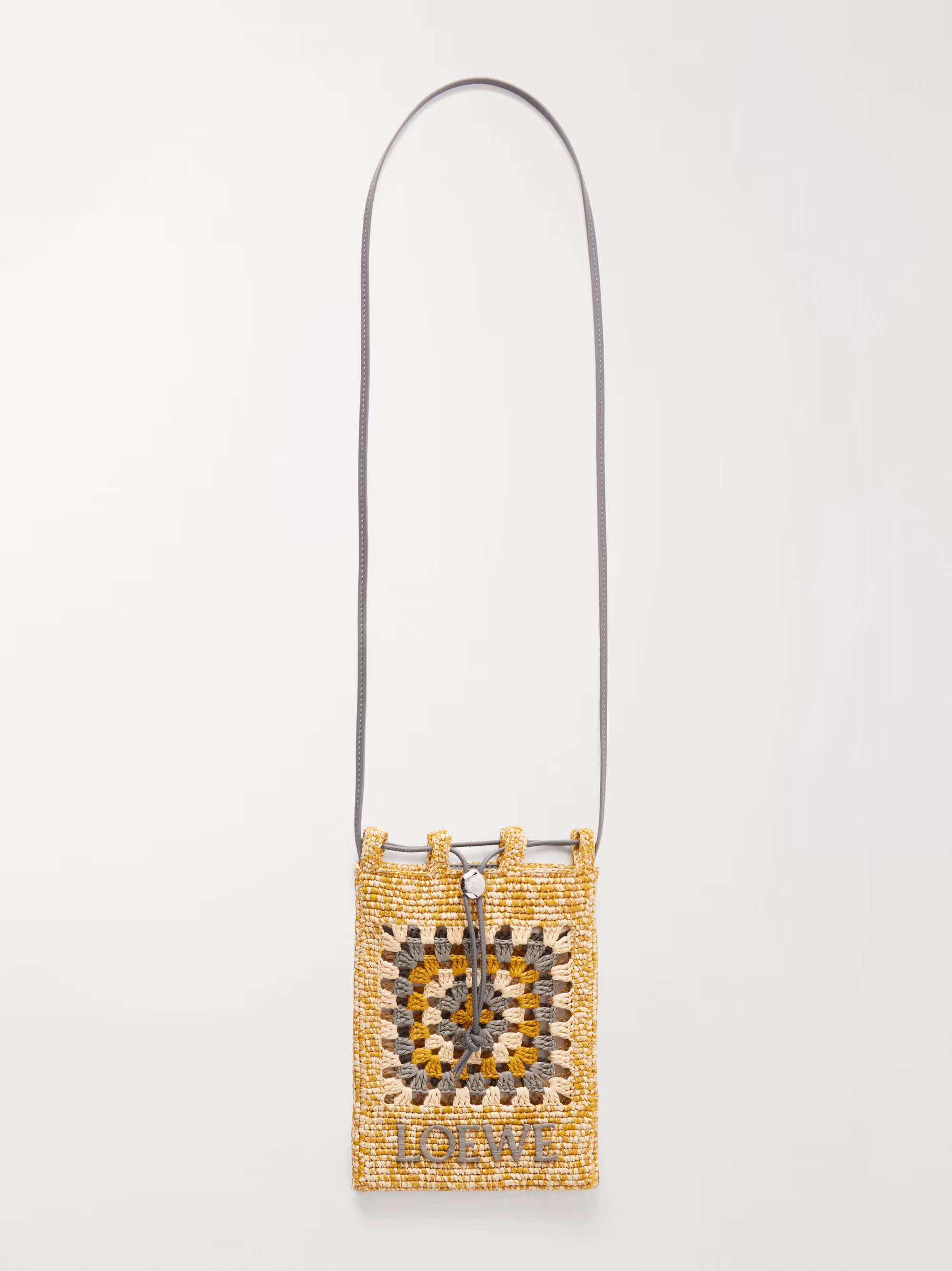 Loewe + Paula's Ibiza leather-trimmed crocheted raffia bucket bag